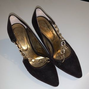 Black heels with gold chain detailing